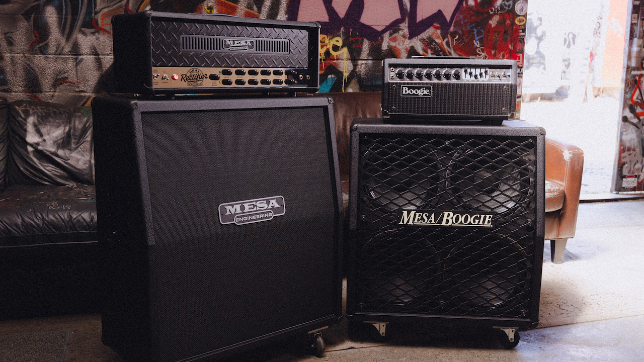 Mesa/Boogie 90s Triple Rectifier amplifier head on top of a Mesa cabinet beside a Mesa/Boogie combo amp.