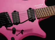 Strandberg Boden Standard NX 6T electric guitar in Electric Fuchsia Metallic finish with tremolo bridge and dual humbuckers.