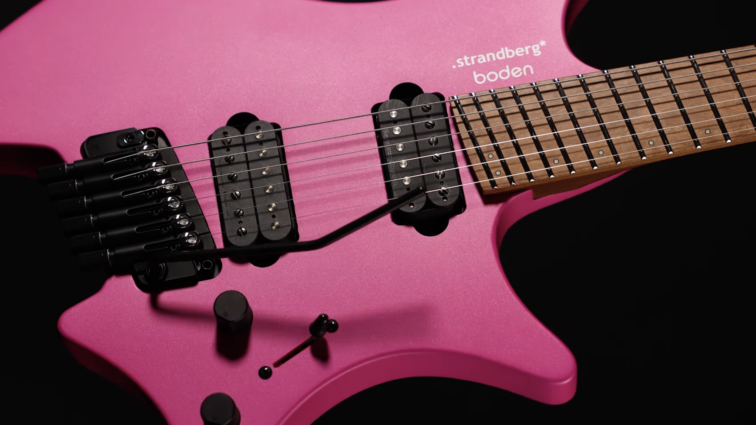 Strandberg Boden Standard NX 6T electric guitar in Electric Fuchsia Metallic finish with tremolo bridge and dual humbuckers.