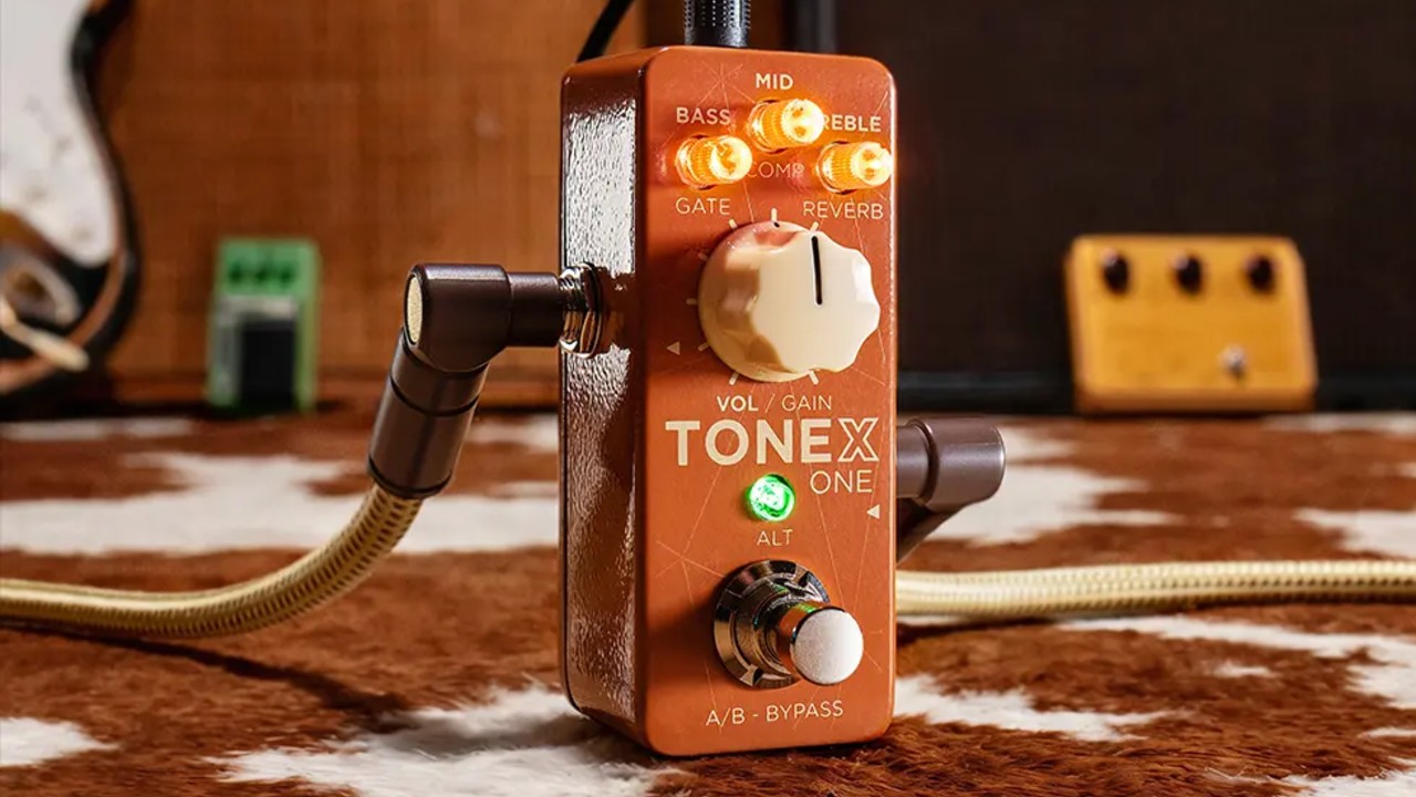 IK Multimedia TONEX ONE Double Special Limited Edition guitar pedal with vintage brown finish and illuminated control knobs.