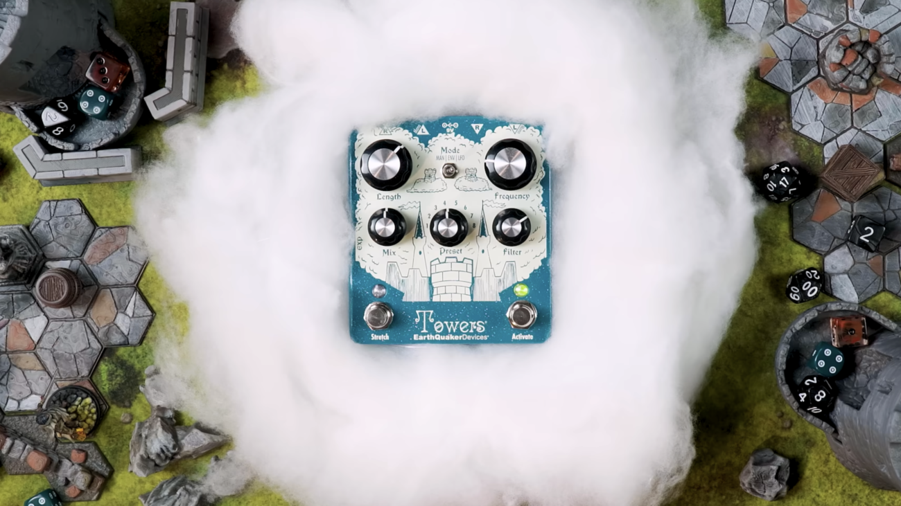 EarthQuaker Devices Towers stereo reverberant filter guitar effects pedal with teal enclosure and castle illustration.