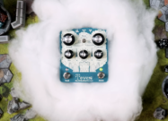 EarthQuaker Devices Towers stereo reverberant filter guitar effects pedal with teal enclosure and castle illustration.
