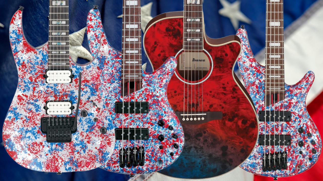 Four Ibanez 250th USA Anniversary electric guitars displayed side by side, each featuring an American flag-inspired red, white, and blue finish.