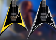 Two special edition ESP Guitars Alexi Laiho signature electric guitars are displayed side by side against a blurred concert-style background. The guitar on the left features a black offset V-shaped body with bold yellow bevel accents and gold hardware, while the guitar on the right has a black body with sharp white pinstripe graphics and chrome hardware. Both guitars feature Floyd Rose tremolos, single humbucker pickups, and aggressive metal-inspired styling.