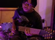 A photo of Dante Swan demoing the new Positive Grid Reactor