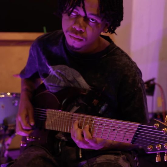A photo of Dante Swan demoing the new Positive Grid Reactor