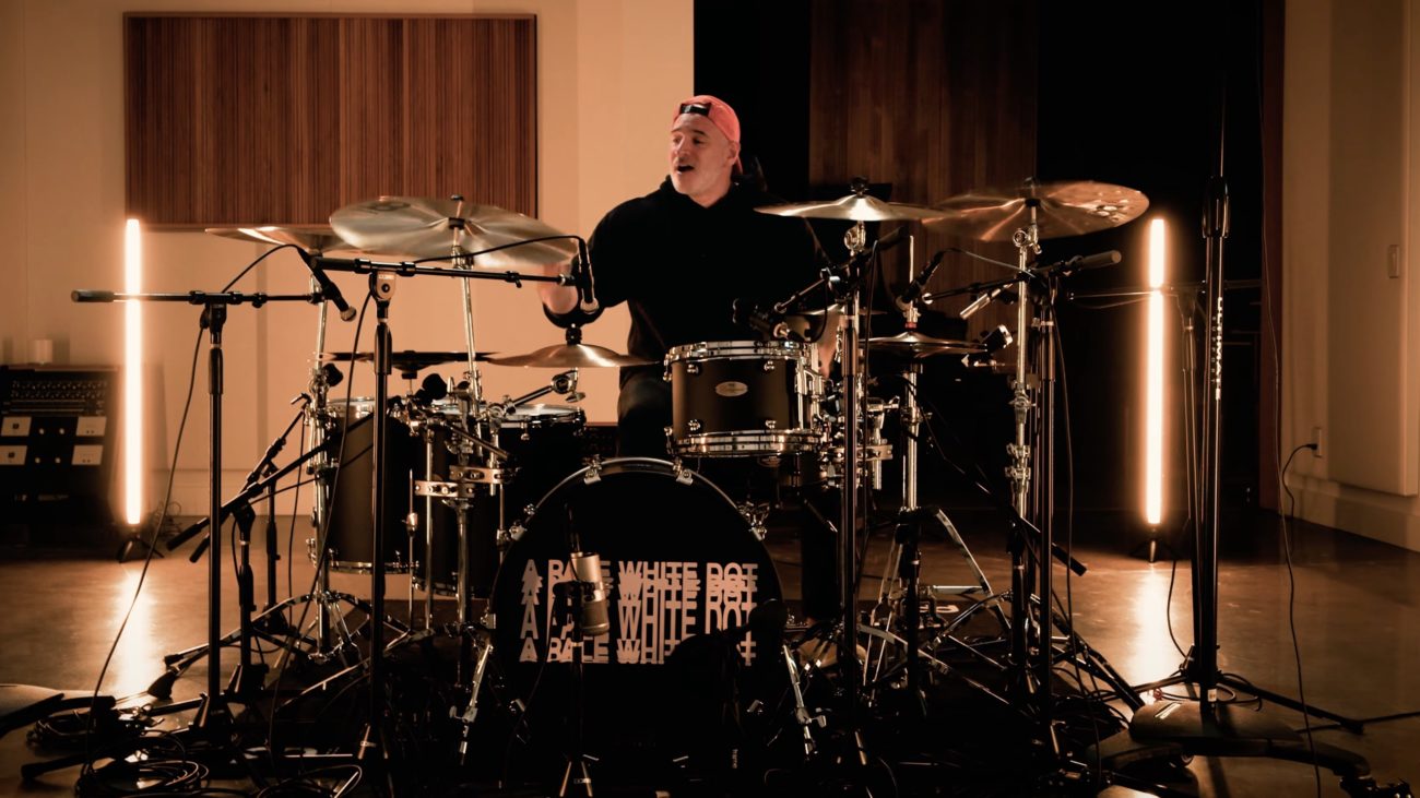 A photo of periphery drummer matt halpern playing meinl cymbals.