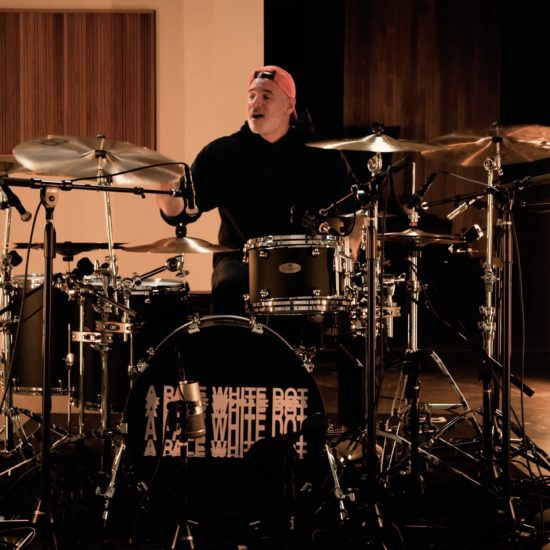A photo of periphery drummer matt halpern playing meinl cymbals.