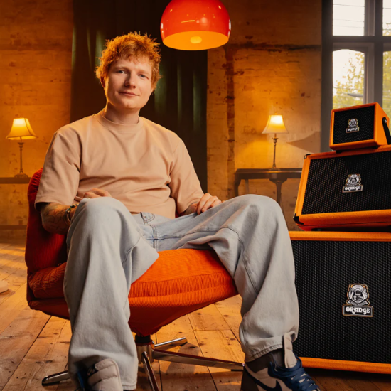 A photo of Ed Sheeran and the line of Orange ES amplifiers