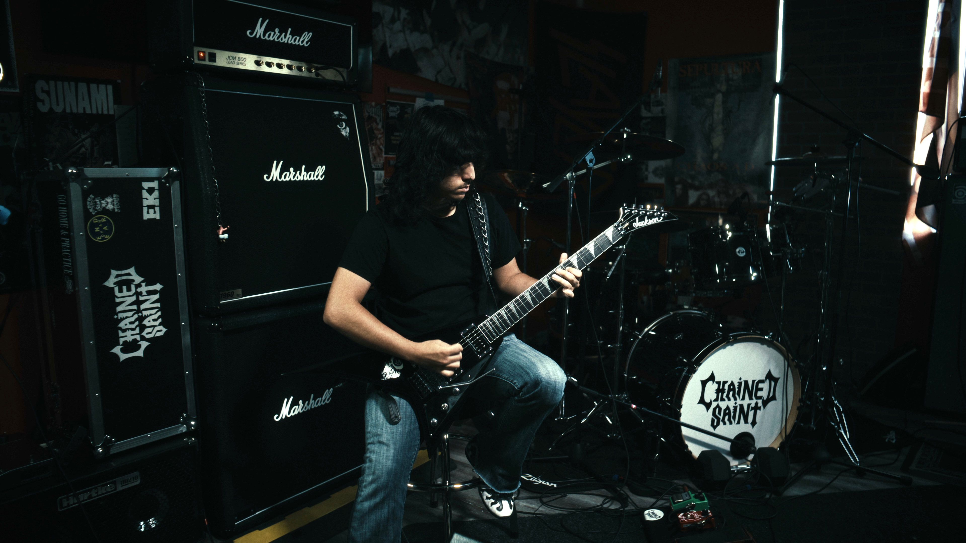 A photo of Ethan Kahn of Chained Saint performing "Dark Side of the Cross"
