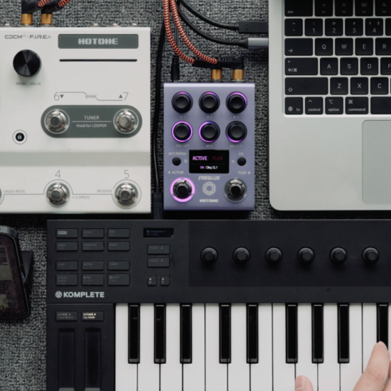 A photo of the Hotone Freqlux paired with a synthesizer