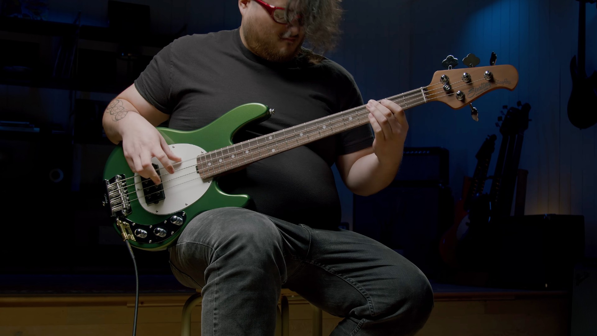 A photo of Brad Williamson demoing the Sterling by Music Man StingRay Short Scale