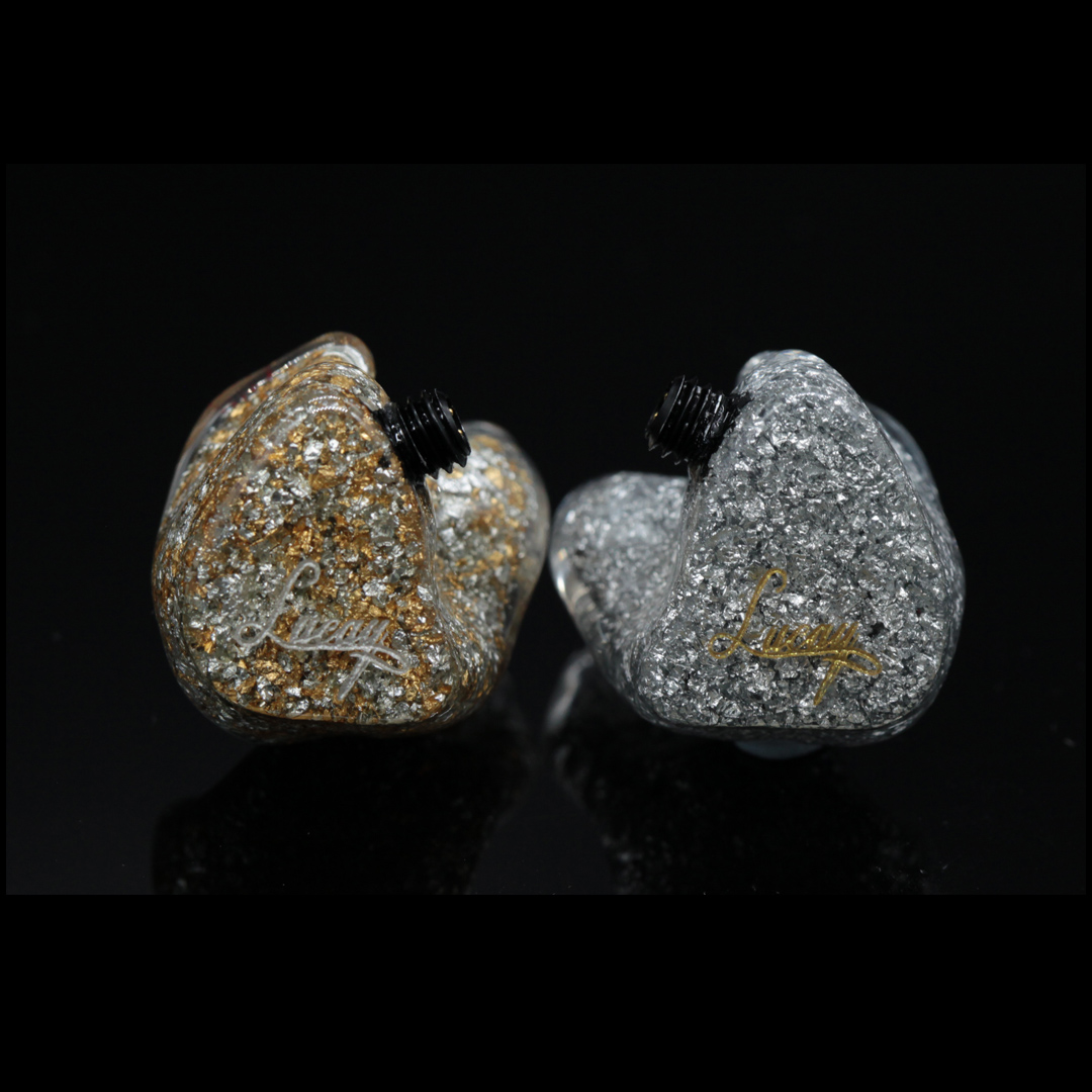 Stealth Sonics custom in-ear monitors with gold and silver glitter shells